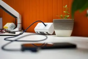 White PANDA US socket on desk